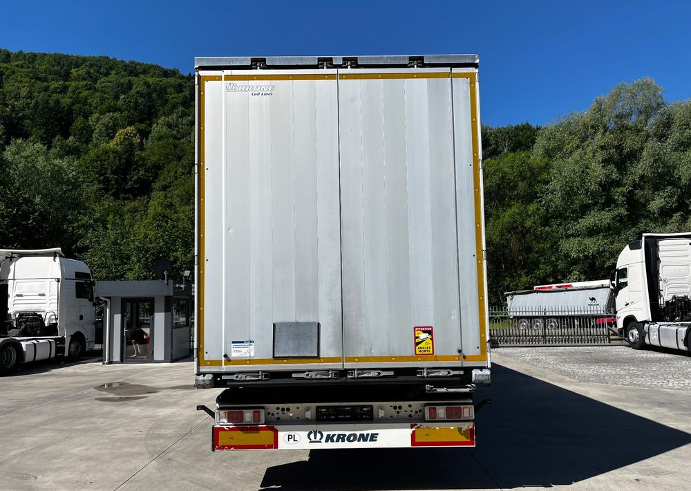Krone Firanka Coilmulde // 9m // Alu Drzwi // Ażury // Oś podnoszona // - الخيمة نصف مقطورة: صور 2 Krone Firanka Coilmulde // 9m // Alu Drzwi // Ażury // Oś podnoszona // - الخيمة نصف مقطورة: صور 2
