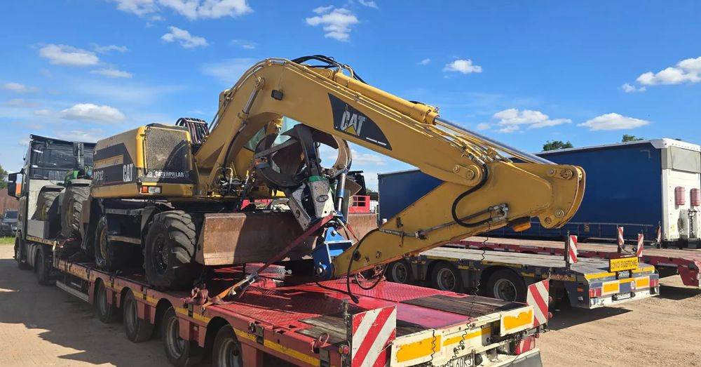 Caterpillar M312 - حفارة على عجلات: صور 1 Caterpillar M312 - حفارة على عجلات: صور 1