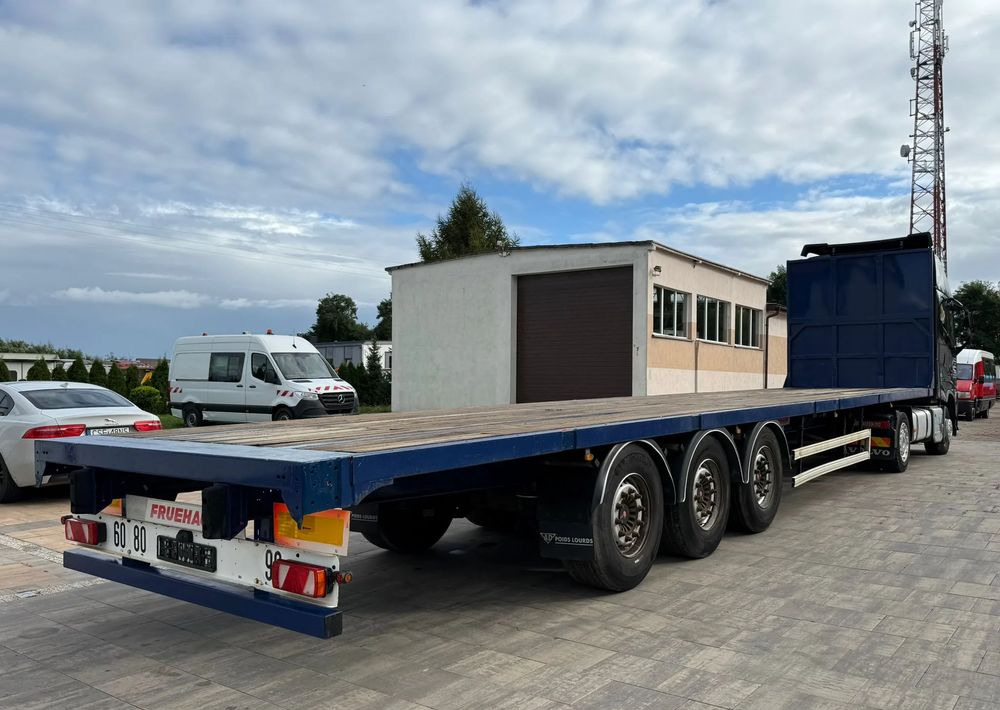 Fruehauf FST4FC - عربة مسطحة منخفضة نصف مقطورة: صور 1 Fruehauf FST4FC - عربة مسطحة منخفضة نصف مقطورة: صور 1