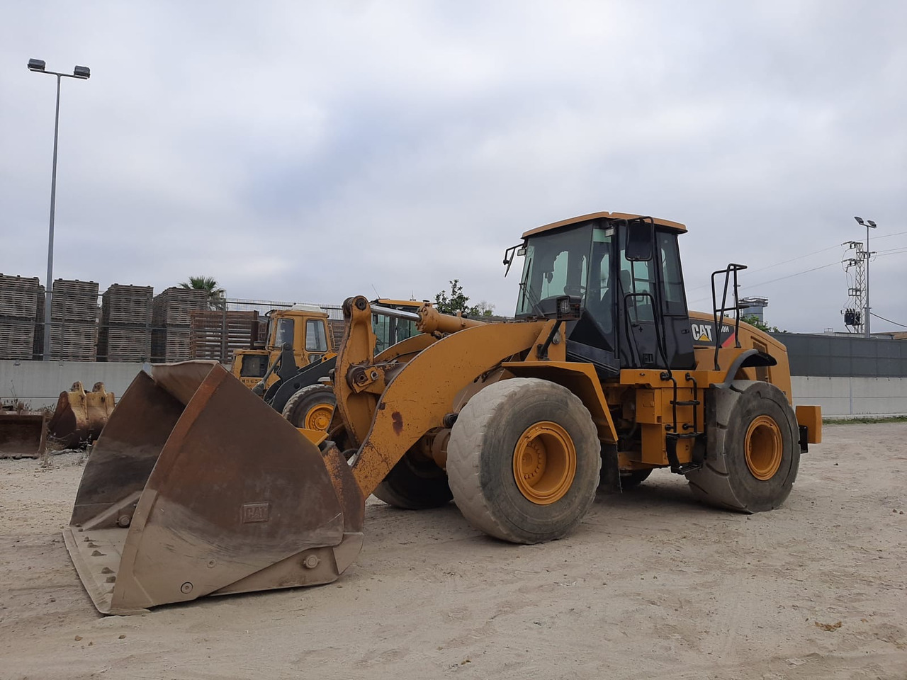Caterpillar 950H - آلات البناء: صور 2 Caterpillar 950H - آلات البناء: صور 2