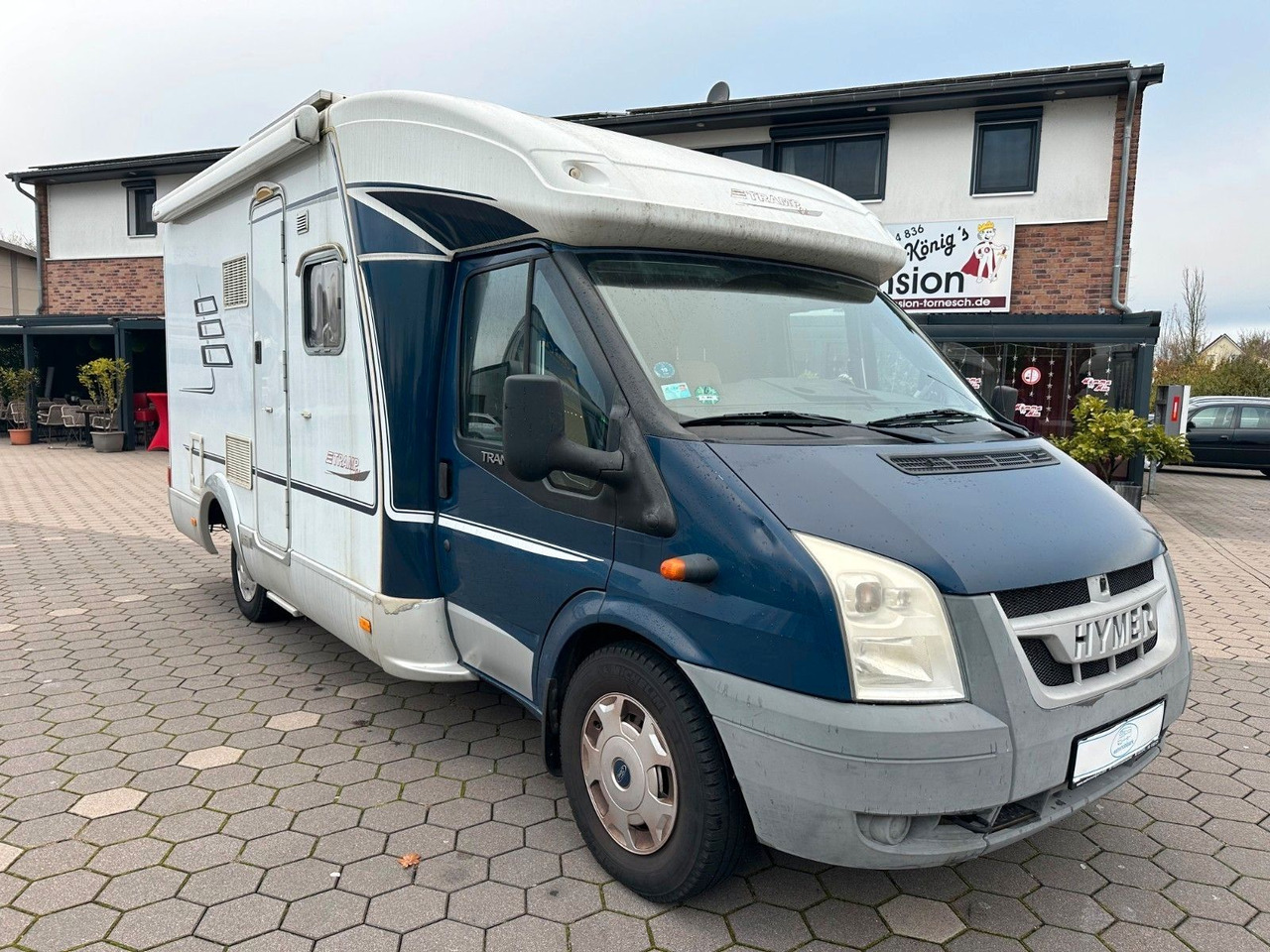 HYMER / ERIBA / HYMERCAR TRAMP T 572 CL/Festbett/Klima/Markise HYMER / ERIBA / HYMERCAR TRAMP T 572 CL/Festbett/Klima/Markise - موتر هوم شبه متكامل: صور 1 HYMER / ERIBA / HYMERCAR TRAMP T 572 CL/Festbett/Klima/Markise HYMER / ERIBA / HYMERCAR TRAMP T 572 CL/Festbett/Klima/Markise - موتر هوم شبه متكامل: صور 1