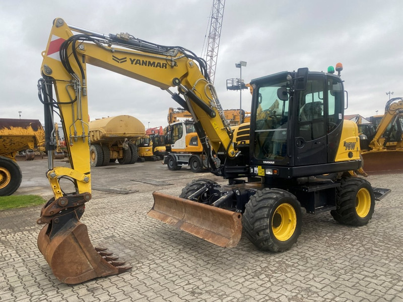 Yanmar B95w NVT - حفارة على عجلات: صور 3 Yanmar B95w NVT - حفارة على عجلات: صور 3