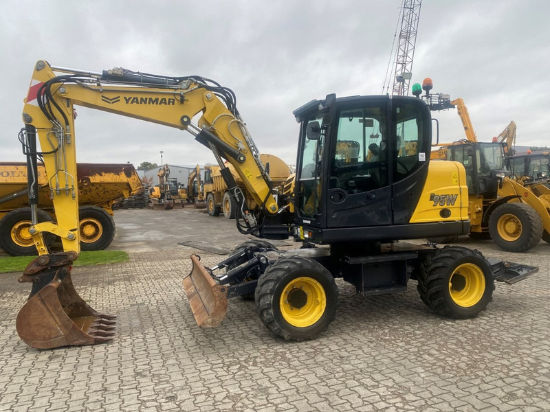 Yanmar B95w NVT - حفارة على عجلات: صور 1 Yanmar B95w NVT - حفارة على عجلات: صور 1