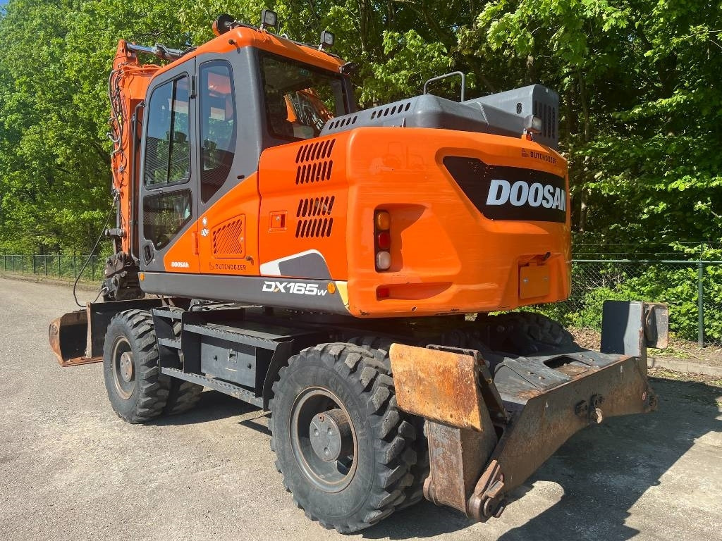 Doosan DX 165 W-5 - حفارة على عجلات: صور 3 Doosan DX 165 W-5 - حفارة على عجلات: صور 3