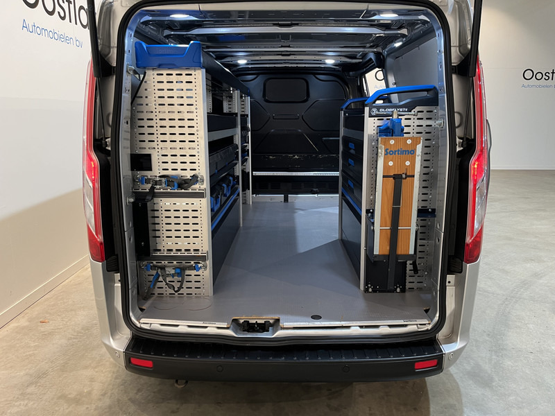 Ford Transit Custom 300 2.0 TDCI L2H1 Trend 130 PK Servicebus / Sortimo Inrichting / Euro 6 / Airco / Cruise Control / Klep / PDC / 3-Zits - فان المدمجة: صور 4 Ford Transit Custom 300 2.0 TDCI L2H1 Trend 130 PK Servicebus / Sortimo Inrichting / Euro 6 / Airco / Cruise Control / Klep / PDC / 3-Zits - فان المدمجة: صور 4