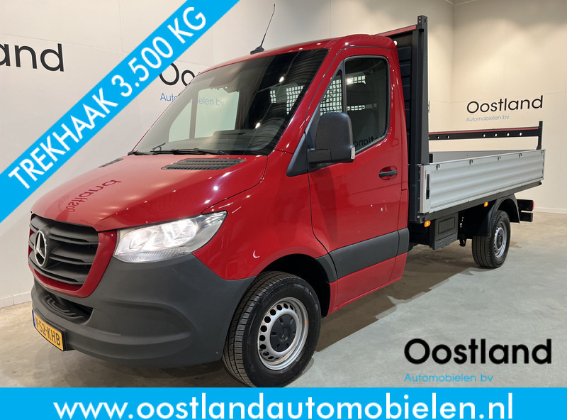 Mercedes-Benz Sprinter 317 CDI L2 RWD Automaat Open Laadbak / Euro 6 / Trekhaak 3500 KG / Airco / Cruise Control / CarPlay / Navigatie / 64.150 KM !! / BPM VRIJ !! - الشاحنات الصغيرة المسطحة: صور 1 Mercedes-Benz Sprinter 317 CDI L2 RWD Automaat Open Laadbak / Euro 6 / Trekhaak 3500 KG / Airco / Cruise Control / CarPlay / Navigatie / 64.150 KM !! / BPM VRIJ !! - الشاحنات الصغيرة المسطحة: صور 1