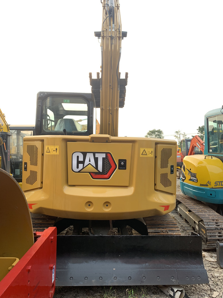 حفارة على عجلات CATERPILLAR 307.5: صور 1