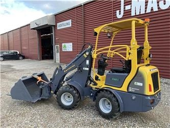 Eurotrac W11 med lang arm, skovl og gafler - لودر مفصلي صغير: صور 1 Eurotrac W11 med lang arm, skovl og gafler - لودر مفصلي صغير: صور 1
