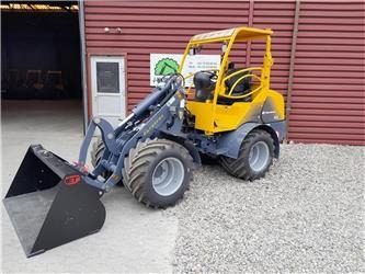 Eurotrac W12 - لودر مفصلي صغير: صور 1 Eurotrac W12 - لودر مفصلي صغير: صور 1