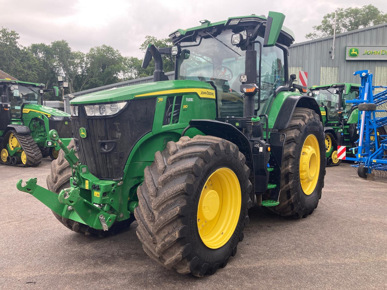 John Deere 7R 310 - جرار: صور 1 John Deere 7R 310 - جرار: صور 1
