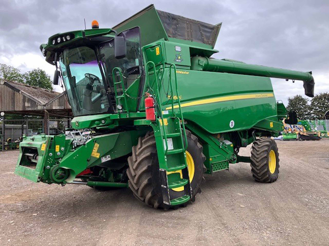 John Deere T560i HillMaster - حصادة شاملة: صور 1 John Deere T560i HillMaster - حصادة شاملة: صور 1