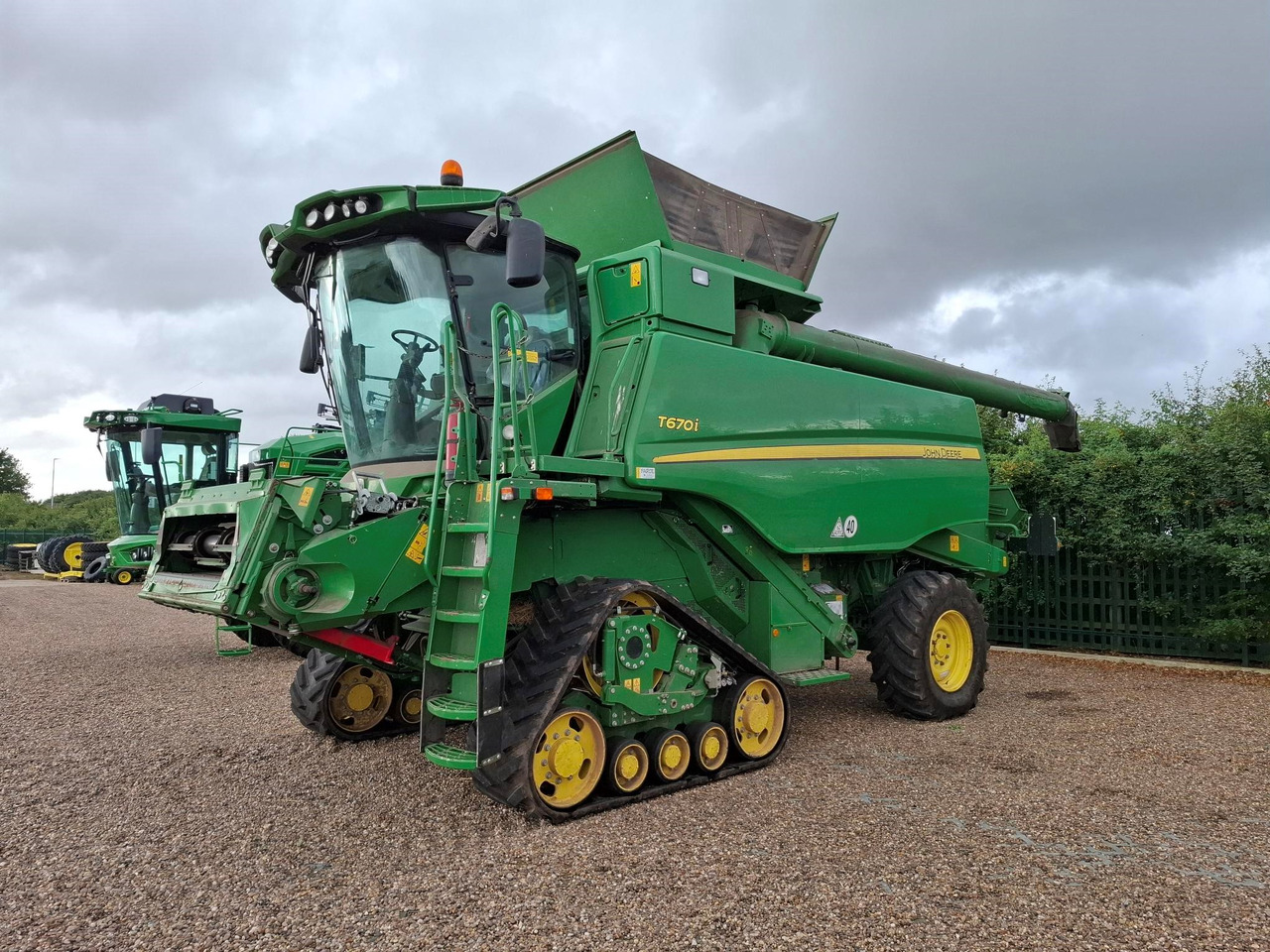 John Deere T670i - حصادة شاملة: صور 1 John Deere T670i - حصادة شاملة: صور 1