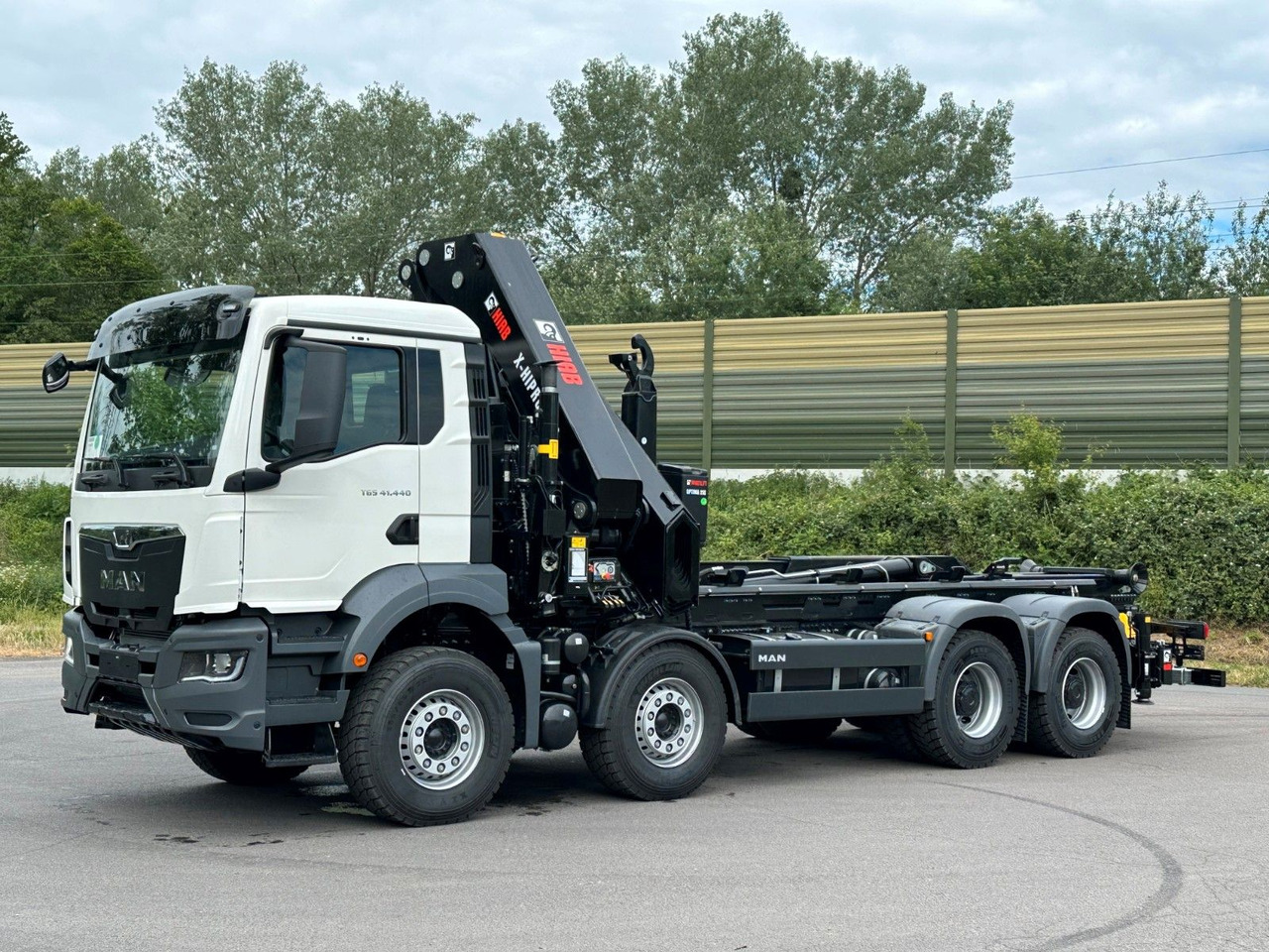 MAN TGS 35.520 8x4 Abrollkipper + Kran HIAB 658E6 - شاحنة ذات الخطاف, شاحنة كرين: صور 3 MAN TGS 35.520 8x4 Abrollkipper + Kran HIAB 658E6 - شاحنة ذات الخطاف, شاحنة كرين: صور 3