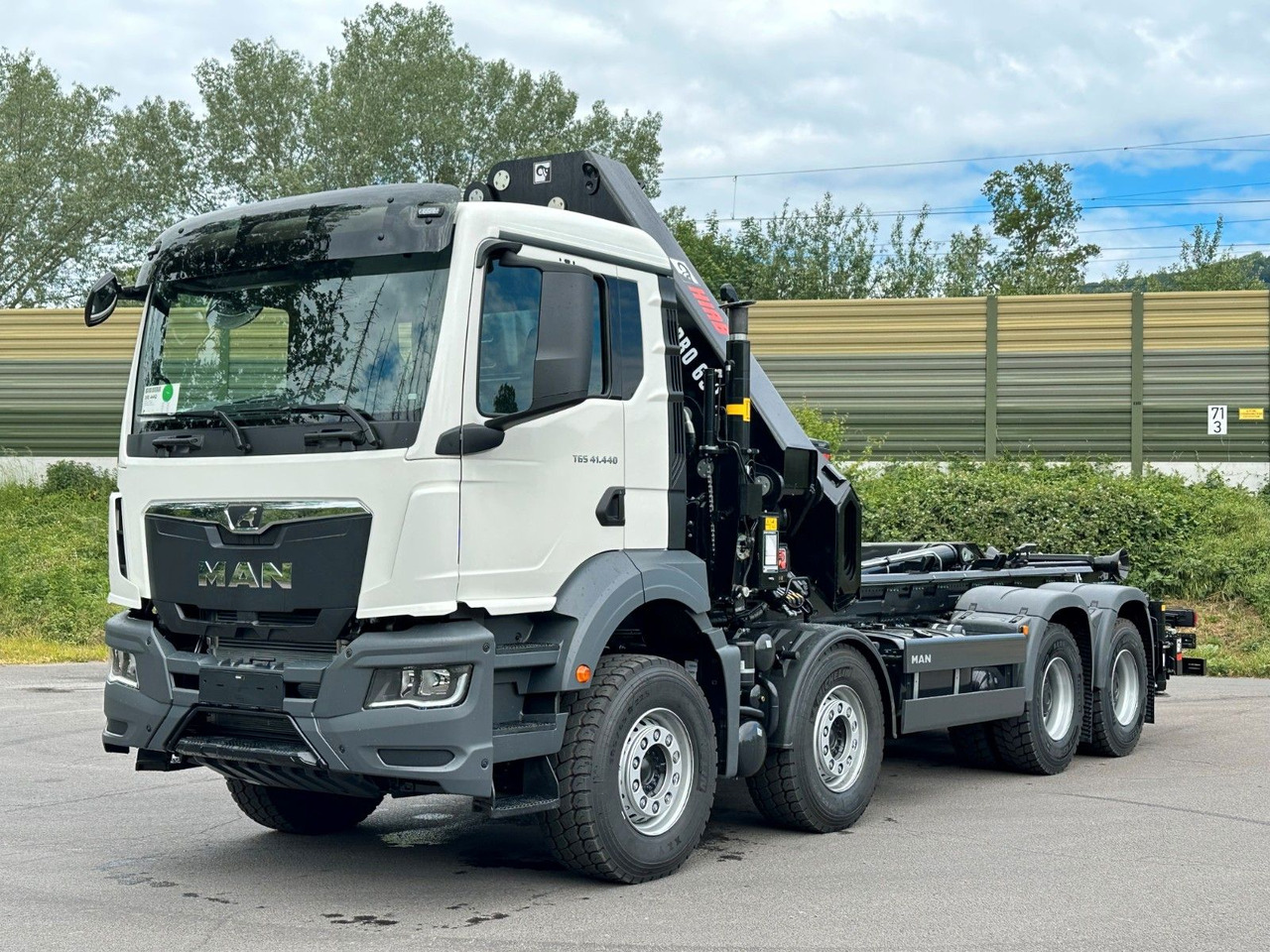 MAN TGS 35.520 8x4 Abrollkipper + Kran HIAB 658E6 - شاحنة ذات الخطاف, شاحنة كرين: صور 2 MAN TGS 35.520 8x4 Abrollkipper + Kran HIAB 658E6 - شاحنة ذات الخطاف, شاحنة كرين: صور 2