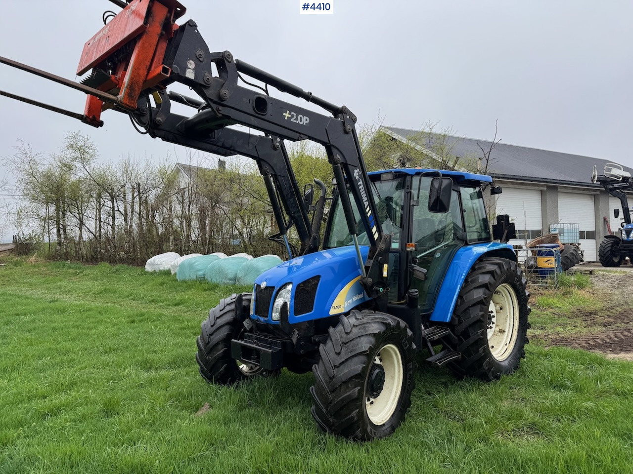 2006 New Holland TL100 A w/Front Loader. - جرار: صور 1 2006 New Holland TL100 A w/Front Loader. - جرار: صور 1