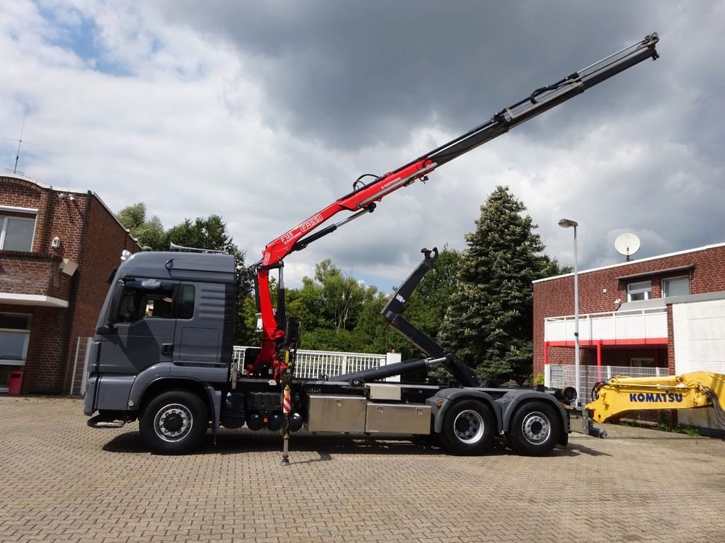 MAN 26.500 Abroller + Fassi F125A Kran 6x2-4 Allrad - شاحنة كرين, شاحنة ذات الخطاف: صور 1 MAN 26.500 Abroller + Fassi F125A Kran 6x2-4 Allrad - شاحنة كرين, شاحنة ذات الخطاف: صور 1
