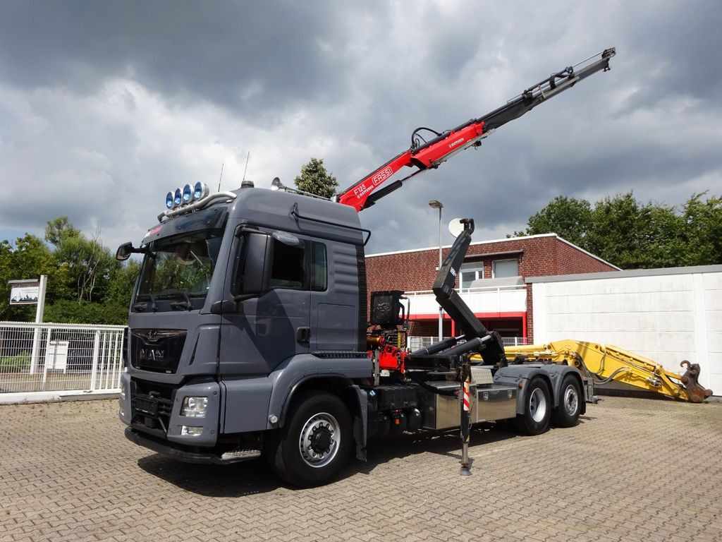MAN 26.500 Abroller + Fassi F125A Kran 6x2-4 Allrad - شاحنة ذات الخطاف, شاحنة كرين: صور 2 MAN 26.500 Abroller + Fassi F125A Kran 6x2-4 Allrad - شاحنة ذات الخطاف, شاحنة كرين: صور 2