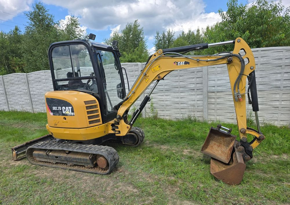Caterpillar - حفارة مصغرة: صور 1 Caterpillar - حفارة مصغرة: صور 1