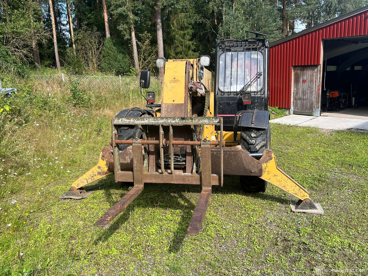 Caterpillar TH63, kurottaja piikeillä ja kauhalla, 2002, Loppi - الآلات والماكينات الزراعية: صور 4 Caterpillar TH63, kurottaja piikeillä ja kauhalla, 2002, Loppi - الآلات والماكينات الزراعية: صور 4