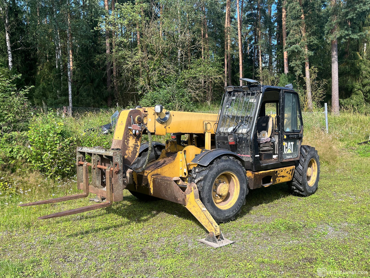 Caterpillar TH63, kurottaja piikeillä ja kauhalla, 2002, Loppi - الآلات والماكينات الزراعية: صور 2 Caterpillar TH63, kurottaja piikeillä ja kauhalla, 2002, Loppi - الآلات والماكينات الزراعية: صور 2