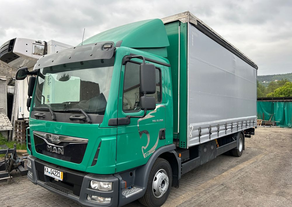 MAN TGL 12.250 6.2m AUTOMAT KLIMA z Niemiec ESP nowe opony EURO 6 / 4.75 rozstaw / zawiesie na wózek widłowy / TOP STAN / okazja nauka jazdy MOŻLIWOŚĆ DOSTOSOWANIA 12t - شاحنة ستارة: صور 1 MAN TGL 12.250 6.2m AUTOMAT KLIMA z Niemiec ESP nowe opony EURO 6 / 4.75 rozstaw / zawiesie na wózek widłowy / TOP STAN / okazja nauka jazdy MOŻLIWOŚĆ DOSTOSOWANIA 12t - شاحنة ستارة: صور 1