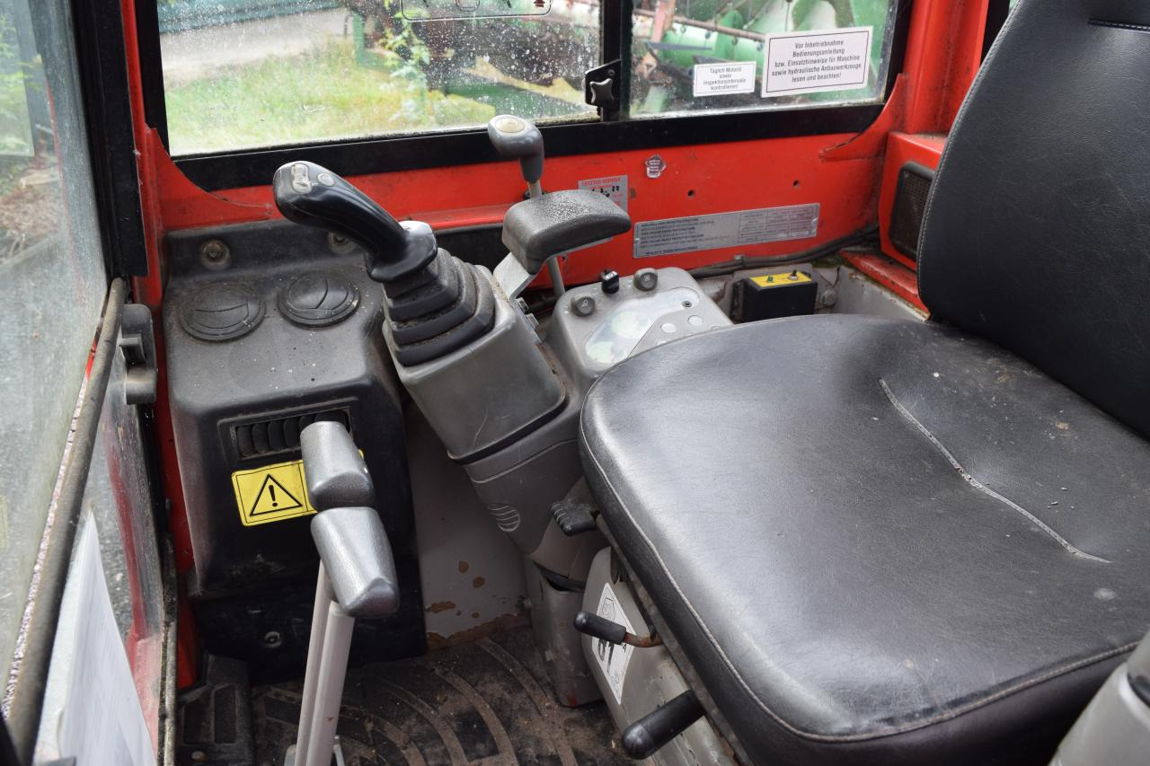Yanmar VIO 25 - 4 - حفارة مصغرة: صور 5 Yanmar VIO 25 - 4 - حفارة مصغرة: صور 5