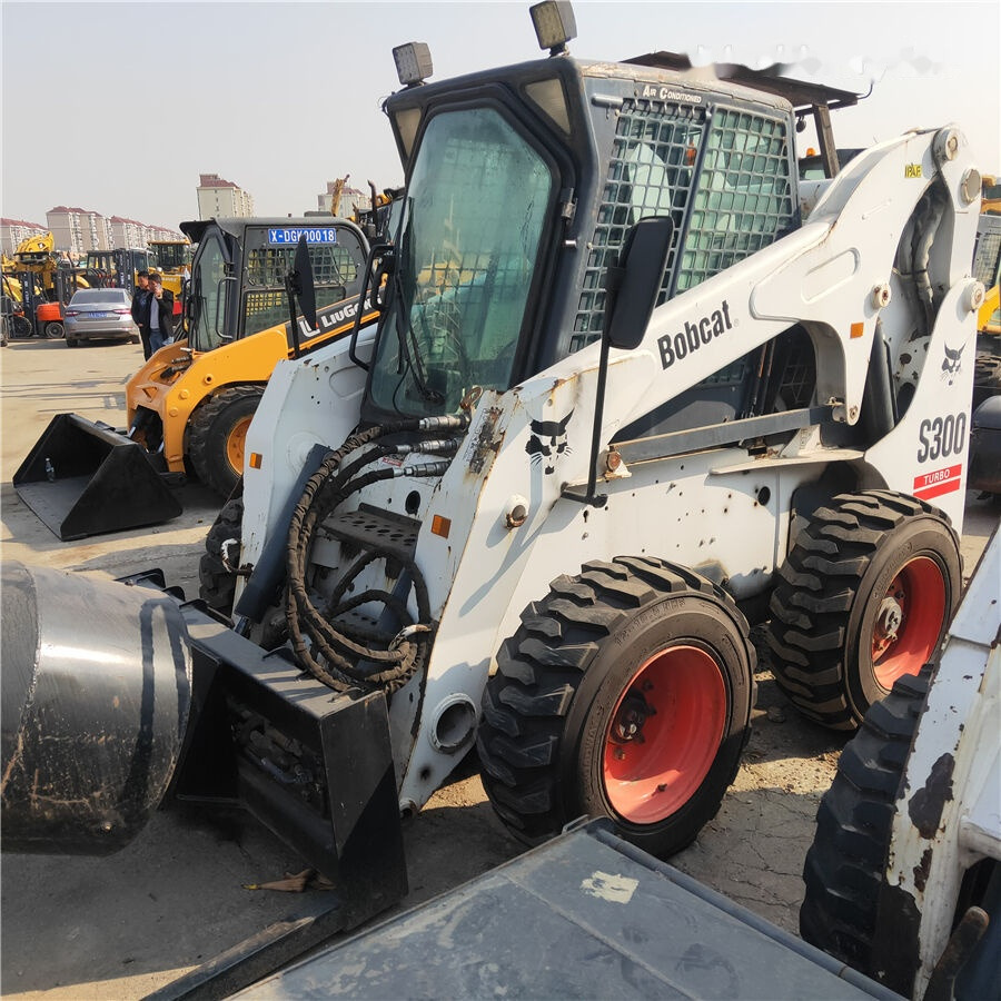 Bobcat S300 - شيول صغير: صور 1 Bobcat S300 - شيول صغير: صور 1