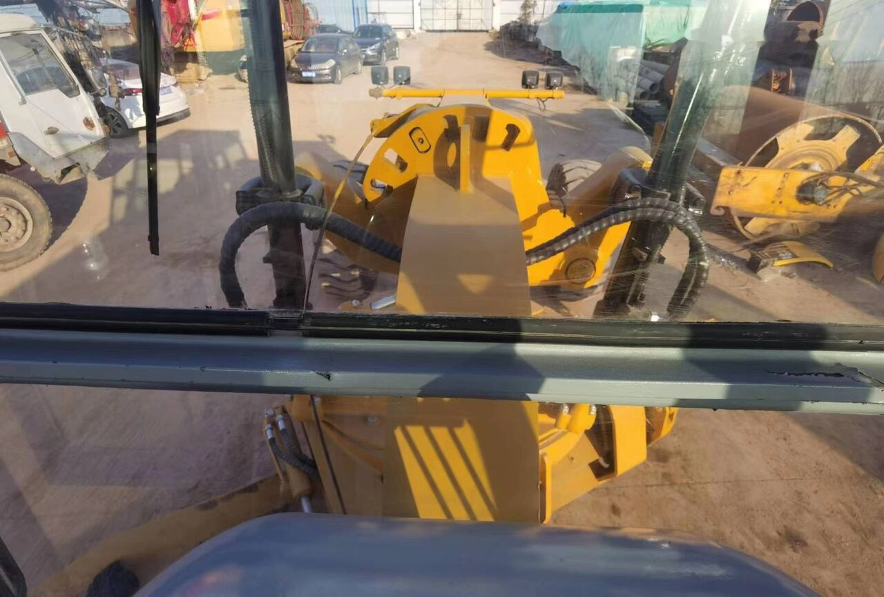 Caterpillar 140G - آلة تسوية الأرض: صور 1 Caterpillar 140G - آلة تسوية الأرض: صور 1