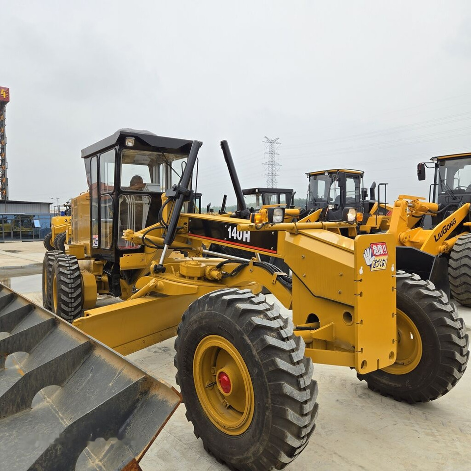Caterpillar 140H - آلة تسوية الأرض: صور 5 Caterpillar 140H - آلة تسوية الأرض: صور 5
