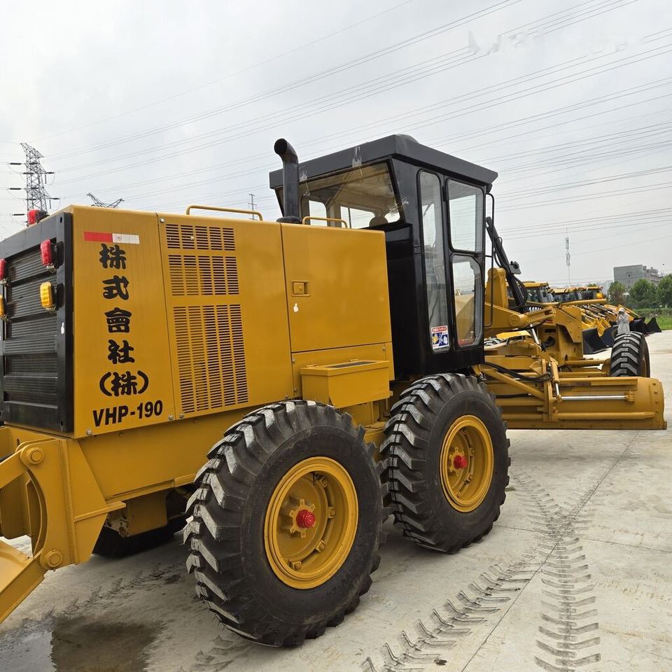آلة تسوية الأرض Caterpillar 140H: صور 6