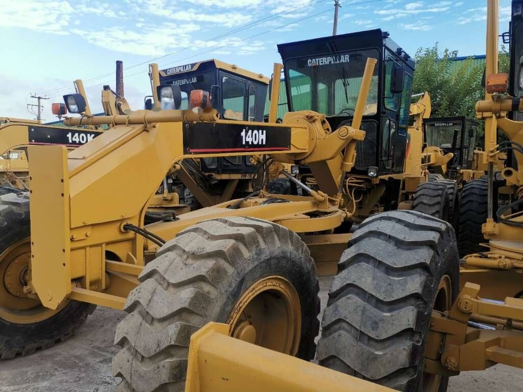 Caterpillar 140H - آلة تسوية الأرض: صور 1 Caterpillar 140H - آلة تسوية الأرض: صور 1