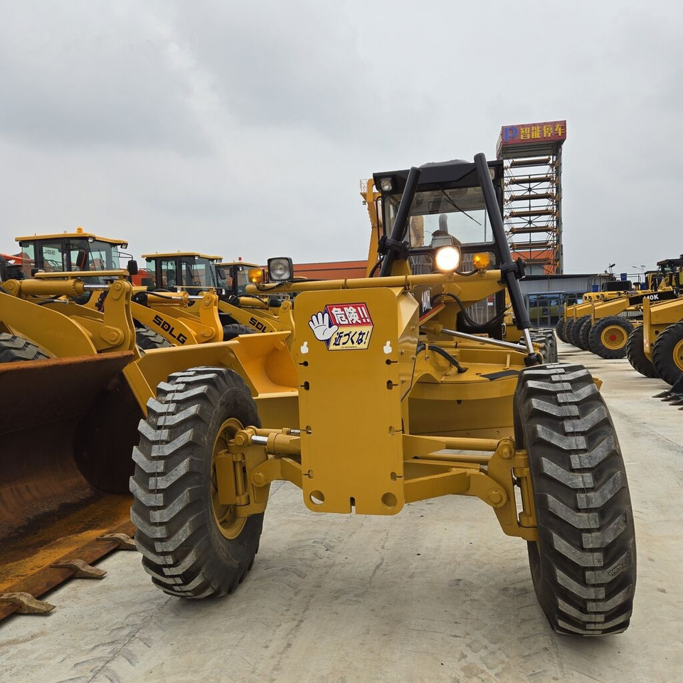 آلة تسوية الأرض Caterpillar 140H: صور 10