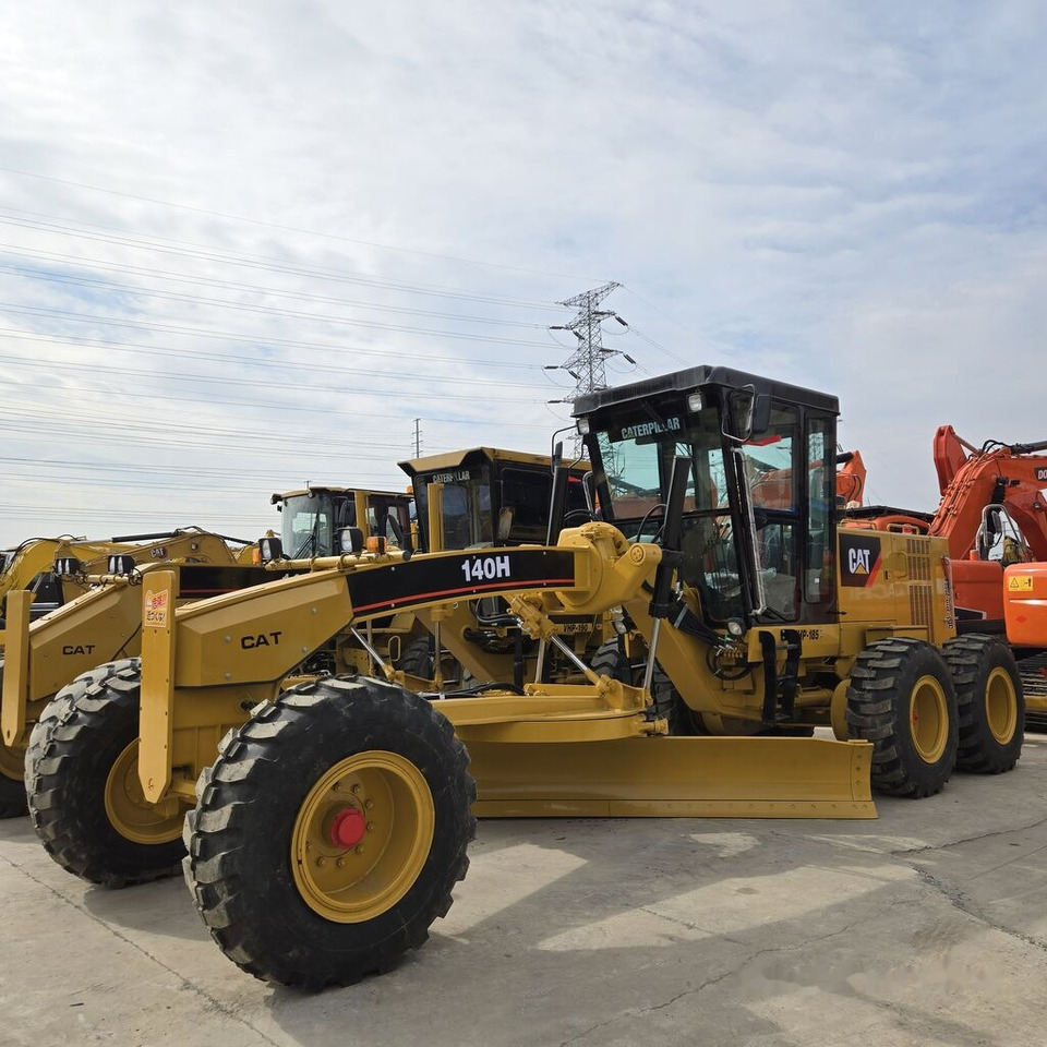 Caterpillar 140H - آلة تسوية الأرض: صور 1 Caterpillar 140H - آلة تسوية الأرض: صور 1