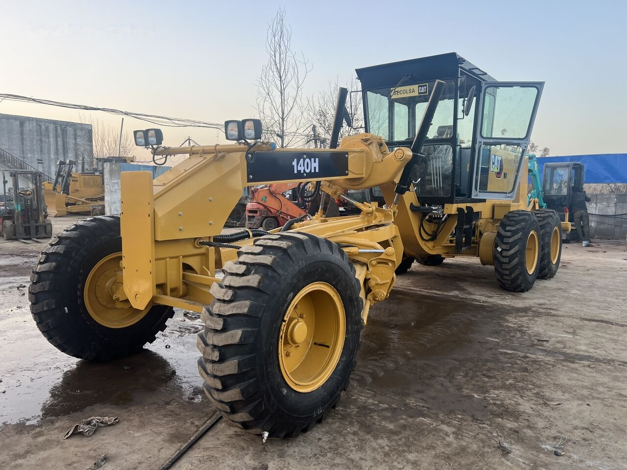 Caterpillar 140H - آلة تسوية الأرض: صور 1 Caterpillar 140H - آلة تسوية الأرض: صور 1