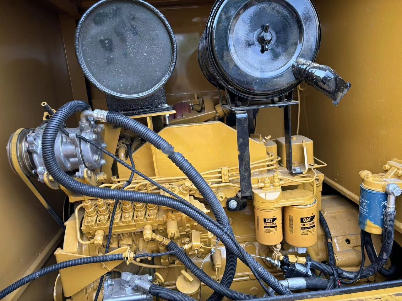 Caterpillar 140K - آلة تسوية الأرض: صور 1 Caterpillar 140K - آلة تسوية الأرض: صور 1