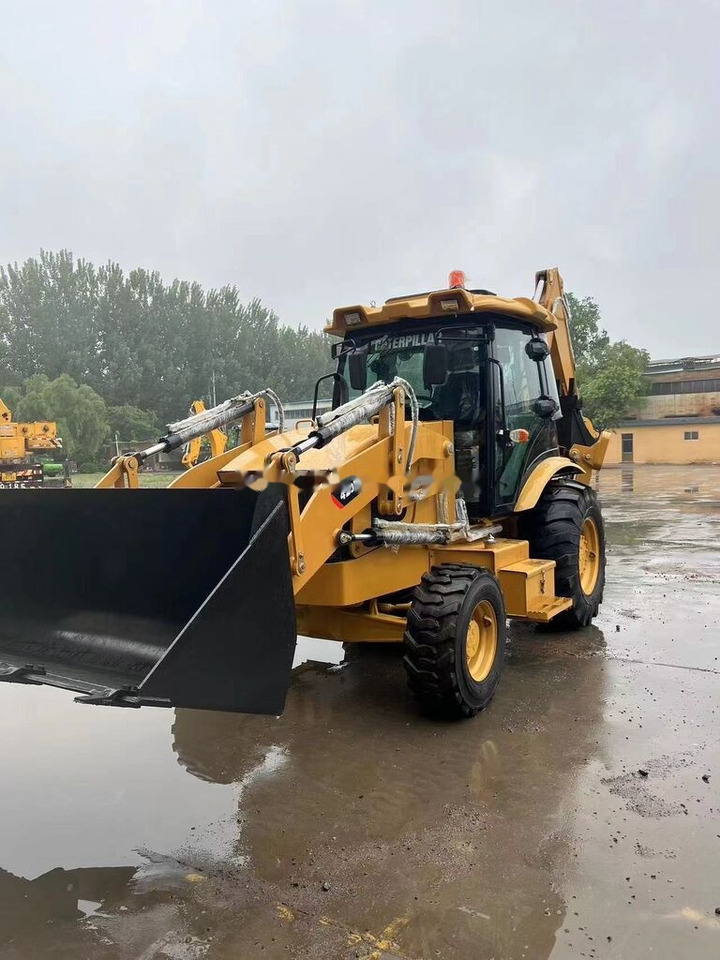 Caterpillar 420F - حفار متعدد الاستخدام: صور 1 Caterpillar 420F - حفار متعدد الاستخدام: صور 1