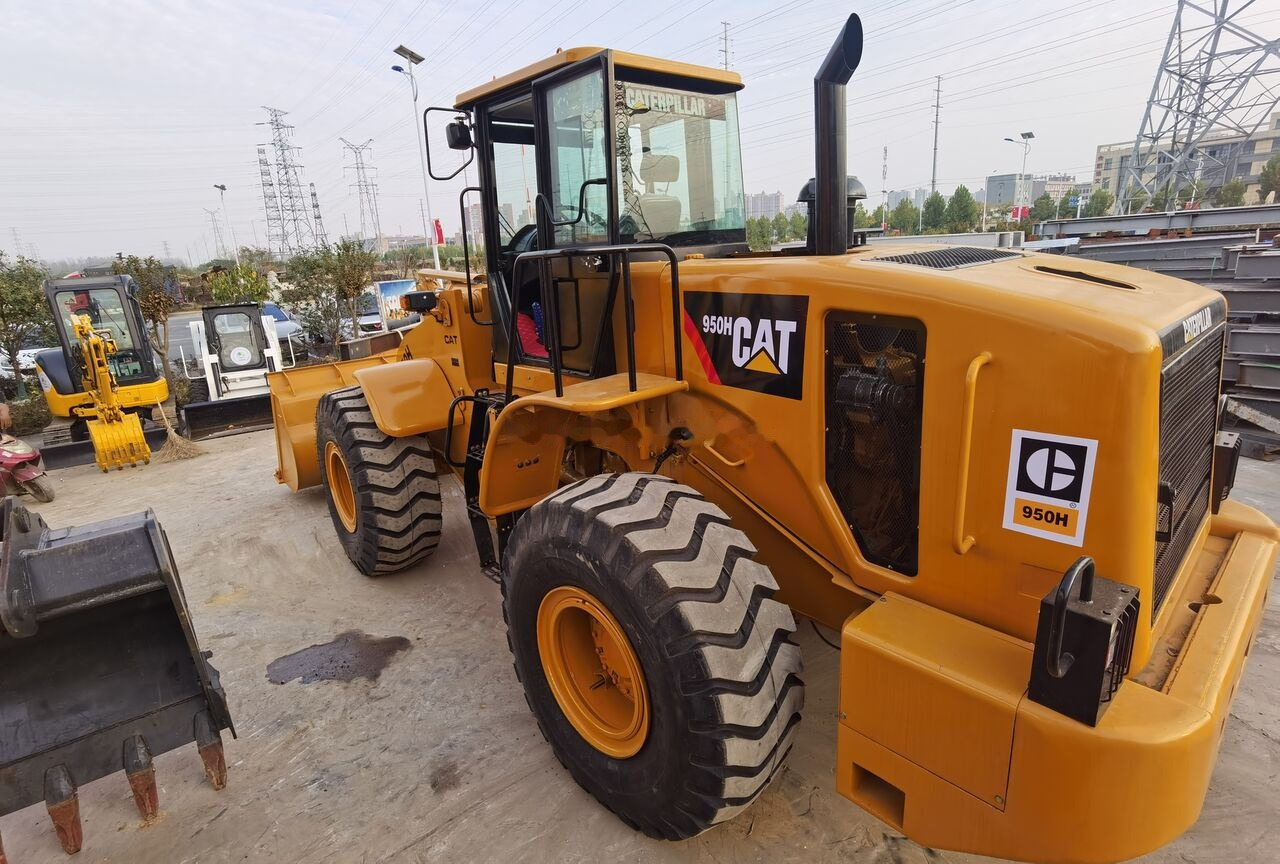 اللودر بعجل Caterpillar 950H: صور 8