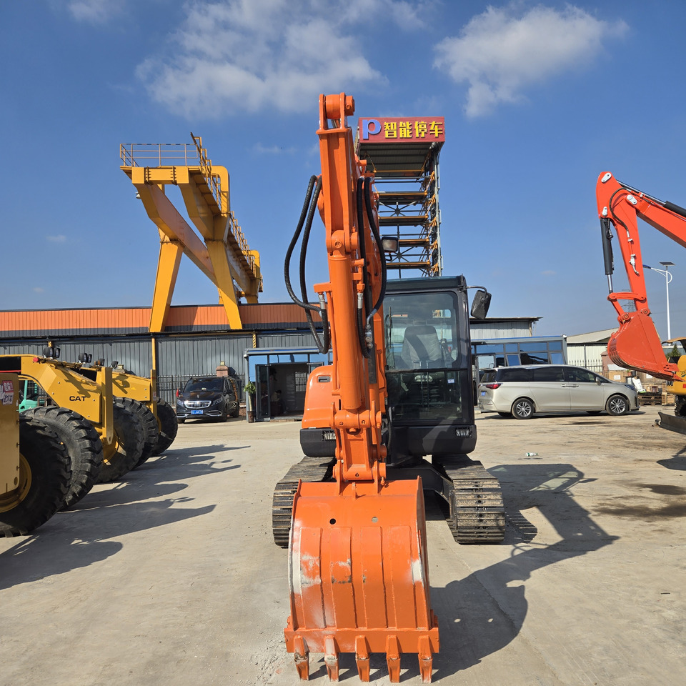 Doosan DX60 - حفارة مصغرة: صور 2 Doosan DX60 - حفارة مصغرة: صور 2