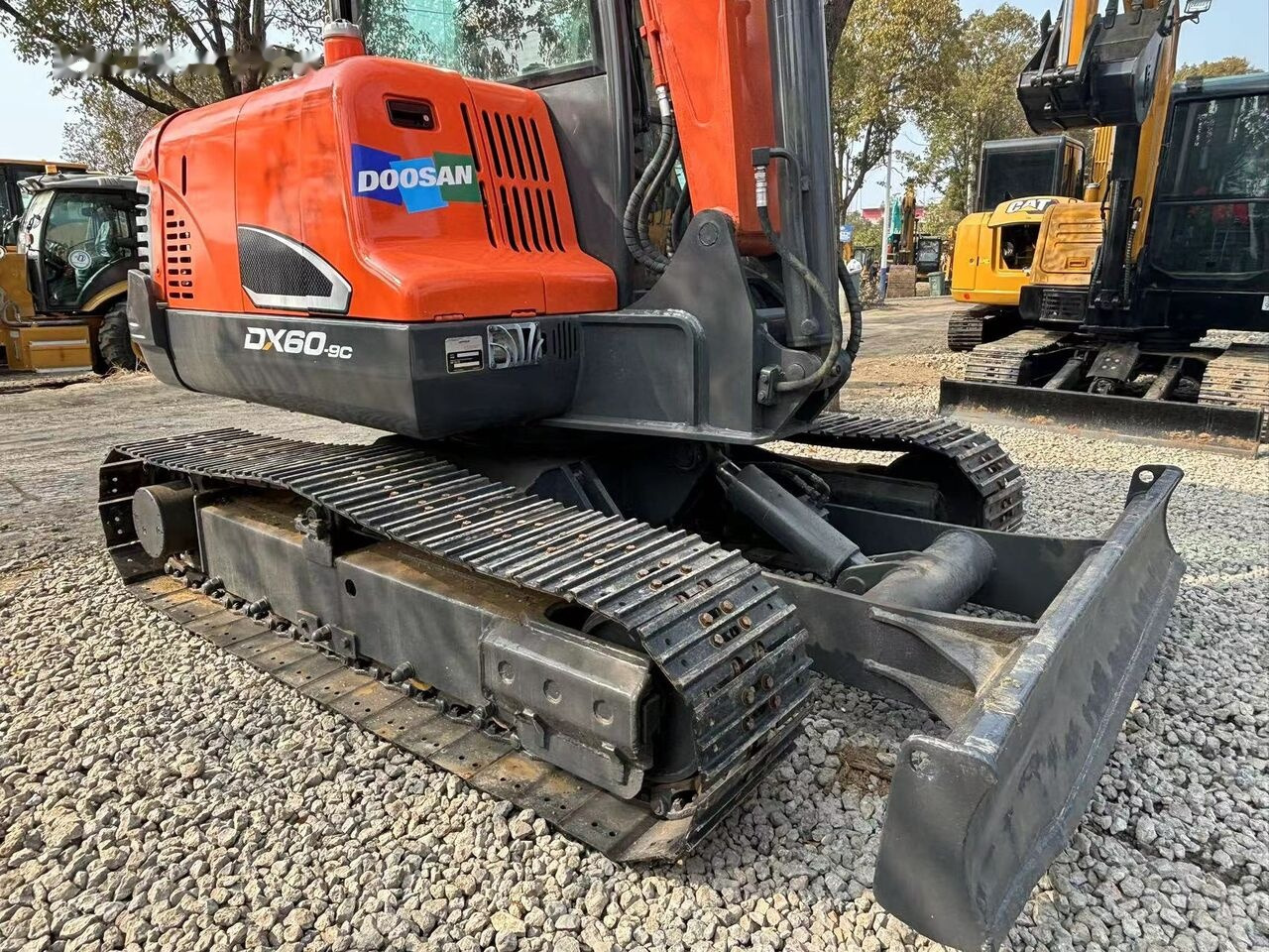Doosan DX60 - حفارة مصغرة: صور 4 Doosan DX60 - حفارة مصغرة: صور 4