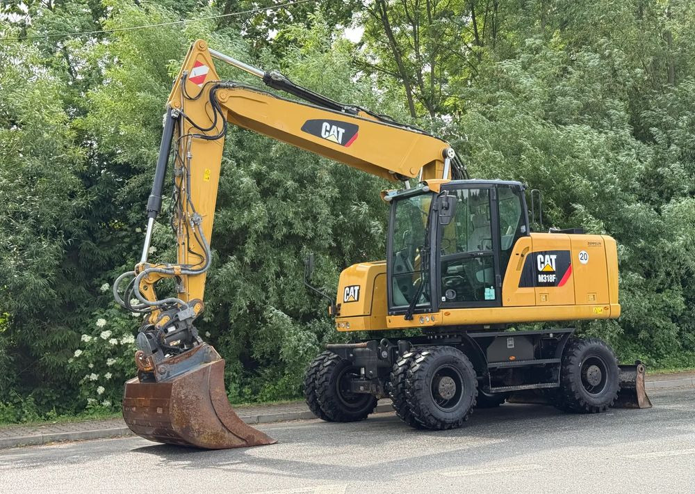 Caterpillar CAT 318 F * Powertilt * Sprowadzony* 9700 MTG * Caterpillar * Stan Perfekcyjny - حفارة على عجلات: صور 1 Caterpillar CAT 318 F * Powertilt * Sprowadzony* 9700 MTG * Caterpillar * Stan Perfekcyjny - حفارة على عجلات: صور 1