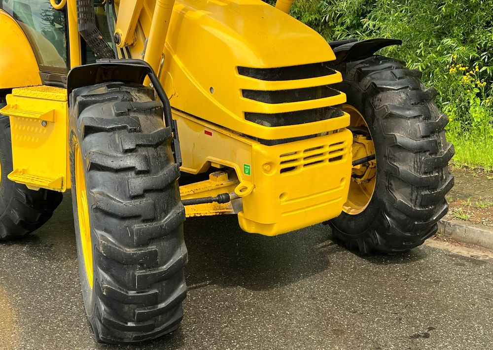 حفار متعدد الاستخدام Komatsu * Koparko Ładowarka * Komatsu WB 97 S Utility *: صور 13