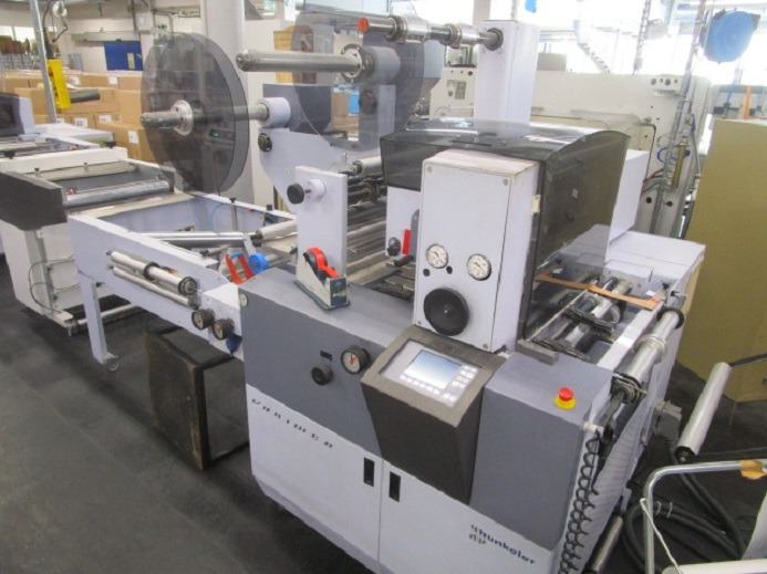 HUNKELER WEITERVERARBEITUNGSSTRASSE (Abwicklung, Stanzen, Wenden, Aufwicklung) - آلات الطباعة: صور 3 HUNKELER WEITERVERARBEITUNGSSTRASSE (Abwicklung, Stanzen, Wenden, Aufwicklung) - آلات الطباعة: صور 3