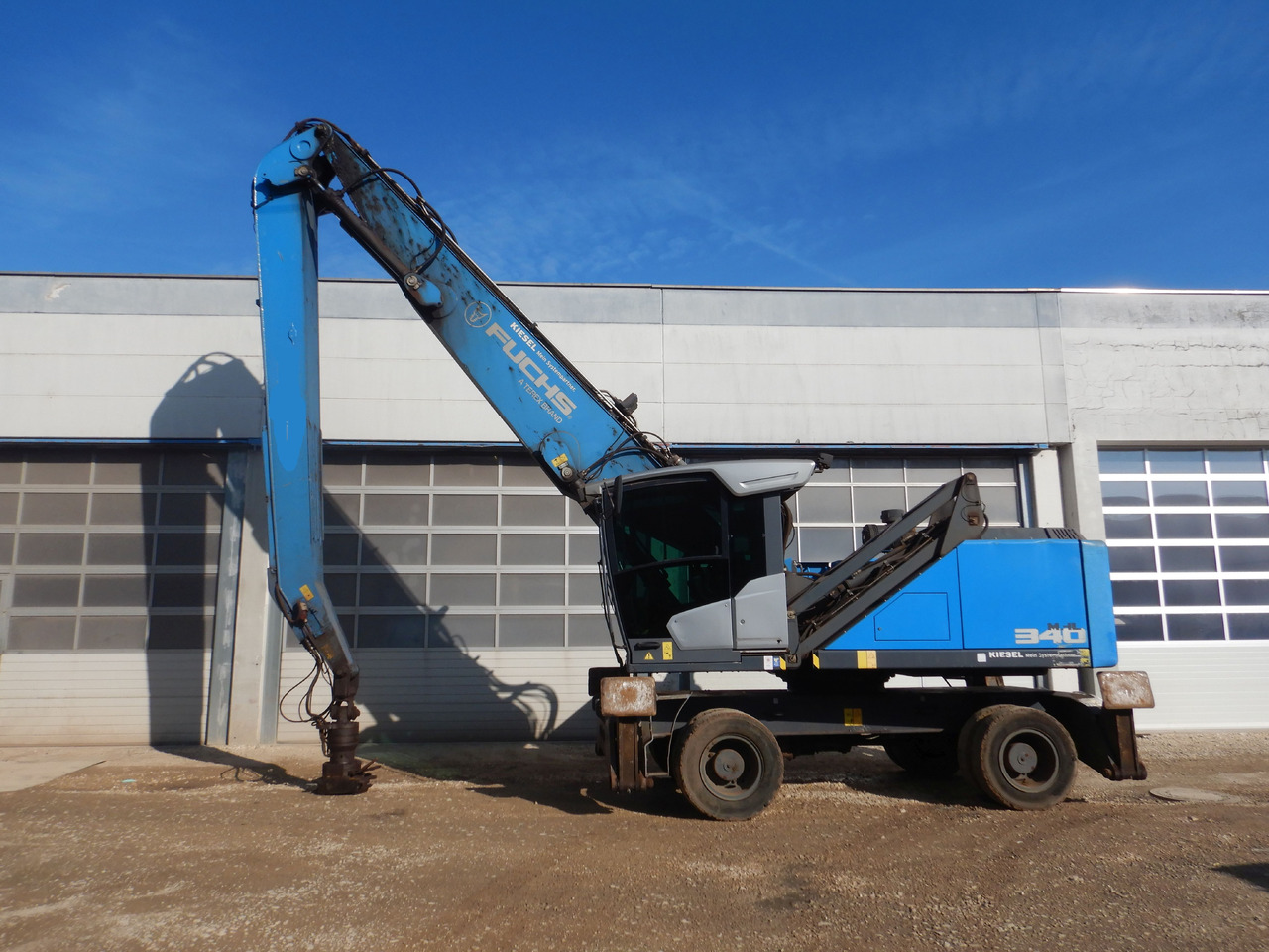 Fuchs MHL 340 F - حفارة النقل والشحن: صور 1 Fuchs MHL 340 F - حفارة النقل والشحن: صور 1
