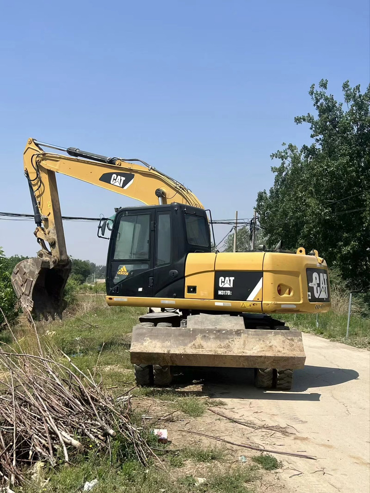 CATERPILLAR M317D2 - حفارة على عجلات: صور 4 CATERPILLAR M317D2 - حفارة على عجلات: صور 4