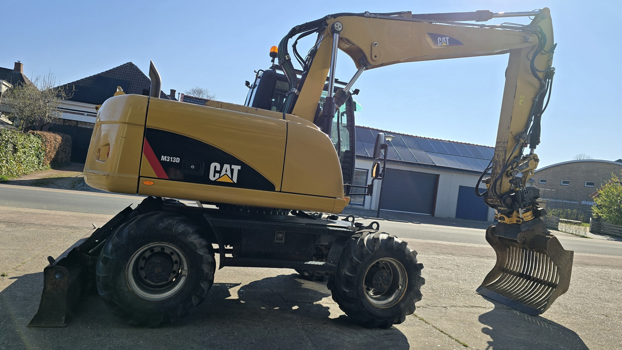 CATERPILLAR M313D - حفارة على عجلات: صور 4 CATERPILLAR M313D - حفارة على عجلات: صور 4