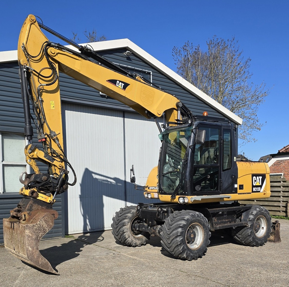 CATERPILLAR M313D - حفارة على عجلات: صور 2 CATERPILLAR M313D - حفارة على عجلات: صور 2