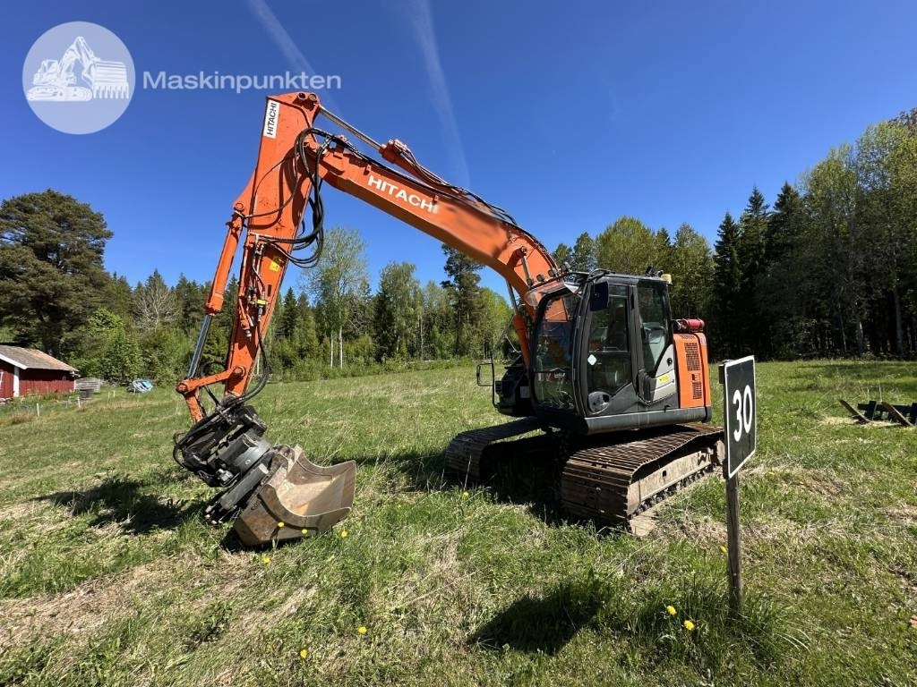 Hitachi ZX 135 US-6 - حفارات زحافة: صور 2 Hitachi ZX 135 US-6 - حفارات زحافة: صور 2
