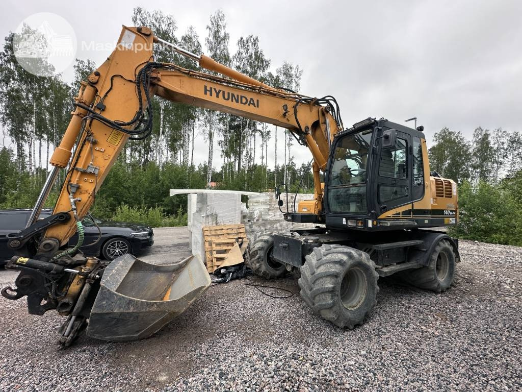 Hyundai Robex 140 W-7 A - حفارة على عجلات: صور 1 Hyundai Robex 140 W-7 A - حفارة على عجلات: صور 1