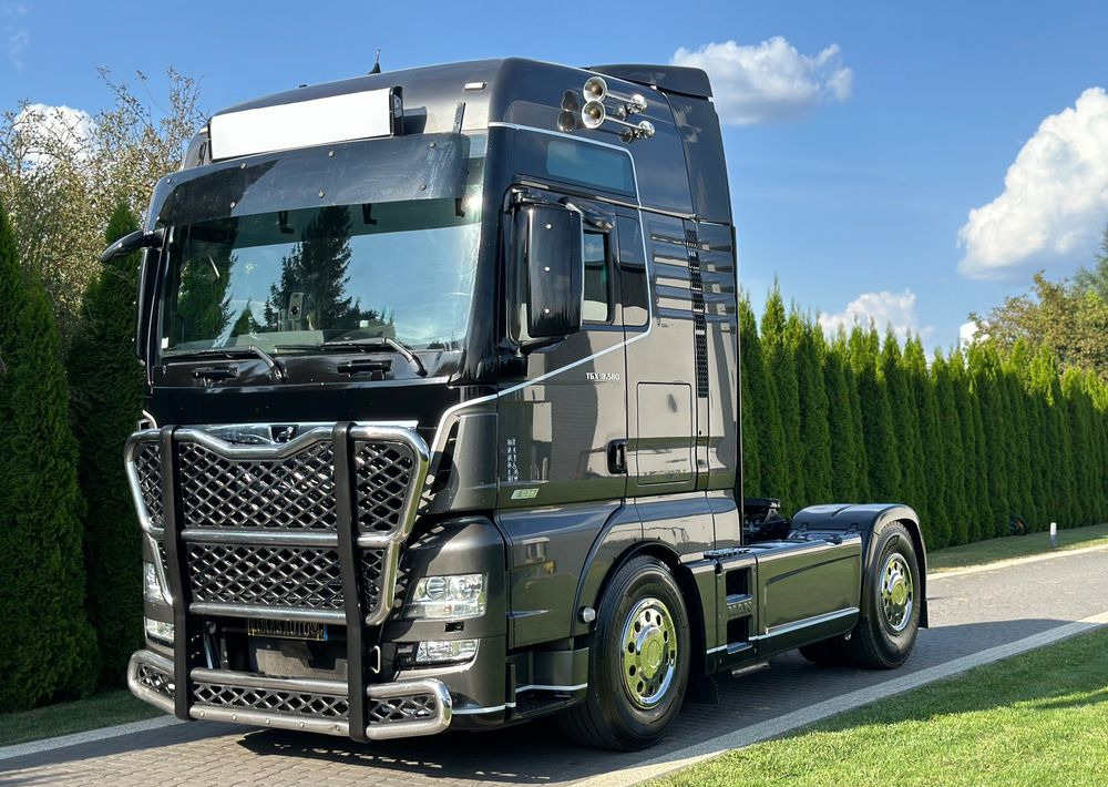 MAN TGX 18.580 D38 XXL RETARDER - شاحنة جرار: صور 1 MAN TGX 18.580 D38 XXL RETARDER - شاحنة جرار: صور 1