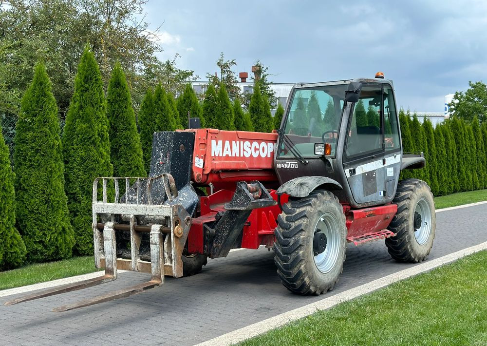 Manitou MT 1233S 12 M - رافعة تلسكوبية: صور 1 Manitou MT 1233S 12 M - رافعة تلسكوبية: صور 1